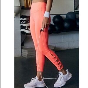 NWOT FREE PEOPLE movement very Prairie leggings in papaya punch size small